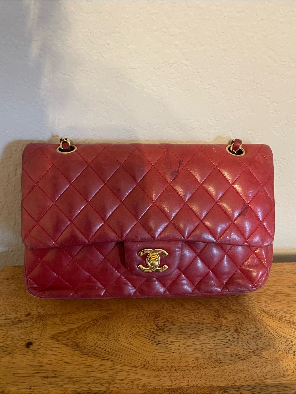 CHANEL Quilted Red Shoulder Bag with Gold CC Lock